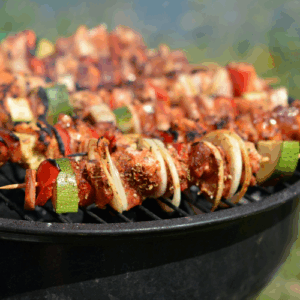 kebabs on a round barbecue