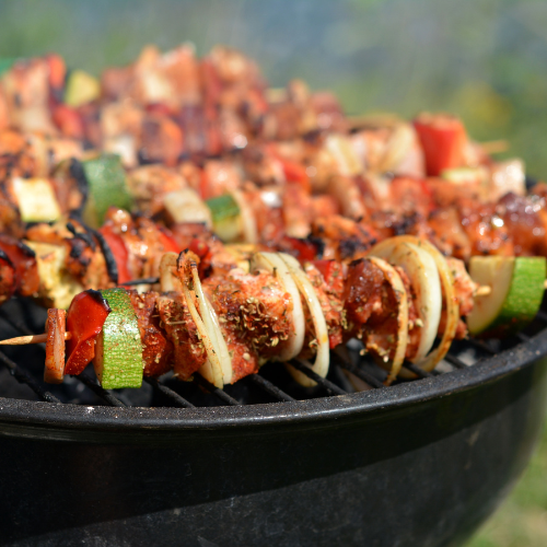 kebabs on a round barbecue